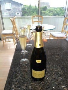 Popping a cork in Bridgehamption - Brut Seduction from Sparkling Pointe vineyard on Long Island's North Fork. Popping a cork in Bridgehamption - Brut Seduction from Sparkling Pointe vineyard on Long Island's North Fork.