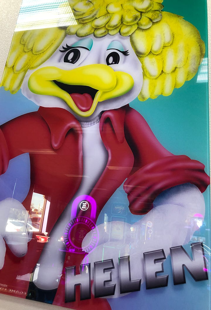 a character from Chuck E. Cheese, who looks like if Helen Hunt were a sassy bird