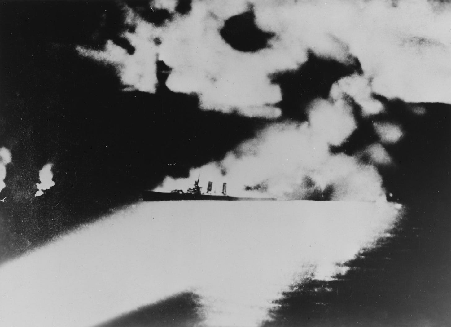 The USS Quincy ablaze, illuminated by Japanese searchlights during 'The Worst Defeat in US Navy History' at the Battle of Savo Island, August 9, 1942. The USS Quincy ablaze, illuminated by Japanese searchlights during 'The Worst Defeat in US Navy History' at the Battle of Savo Island, August 9, 1942.