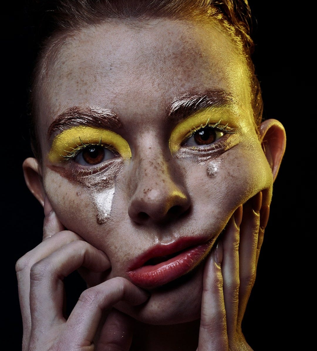 woman with red lipstick and brown eyes woman with red lipstick and brown eyes