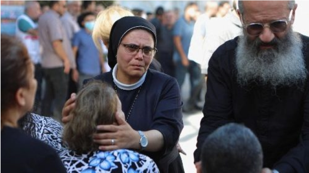 Worshippers attend a funeral at Greek Orthodox Saint Porphyrius Church, in Gaza City.