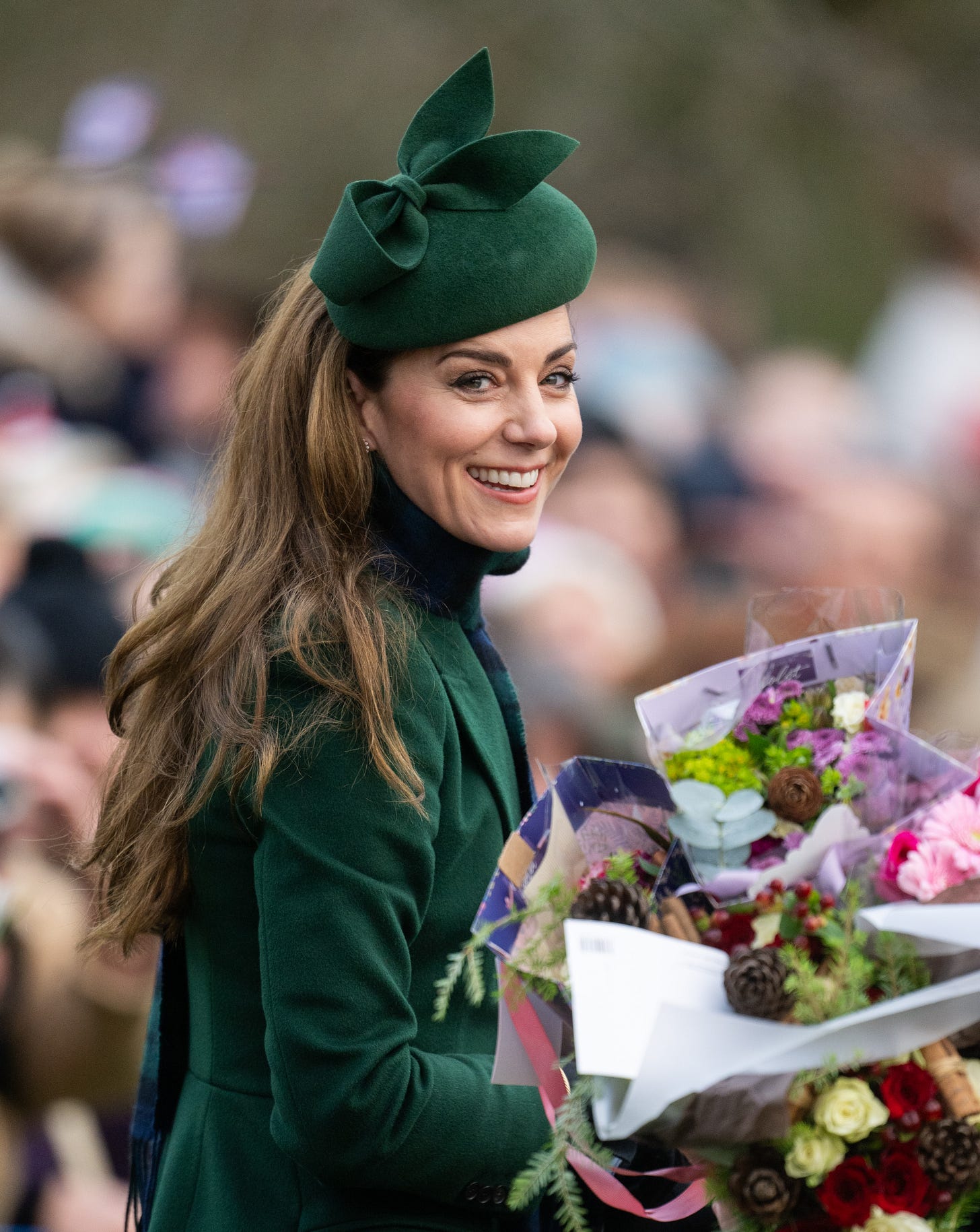 Princess Catherine holding flowers