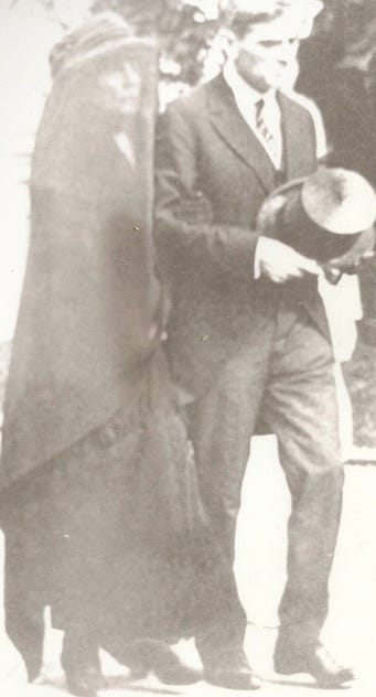 Escorted by her late husband’s private secretary George Christian, the widowed Florence Harding would later be falsely accused of poisoning the President seven years after her own death in 1924. (Photo: National First Ladies Library and Historic Site) Escorted by her late husband’s private secretary George Christian, the widowed Florence Harding would later be falsely accused of poisoning the President seven years after her own death in 1924. (Photo: National First Ladies Library and Historic Site)