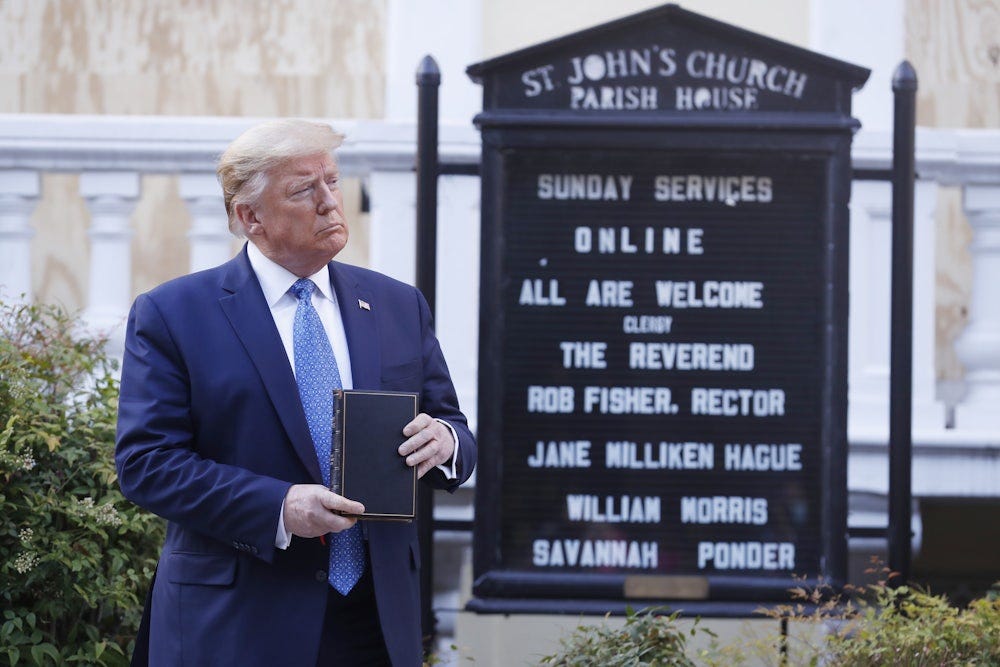 Donald Trump poses with a bible outside St. John's Episcopal Church.