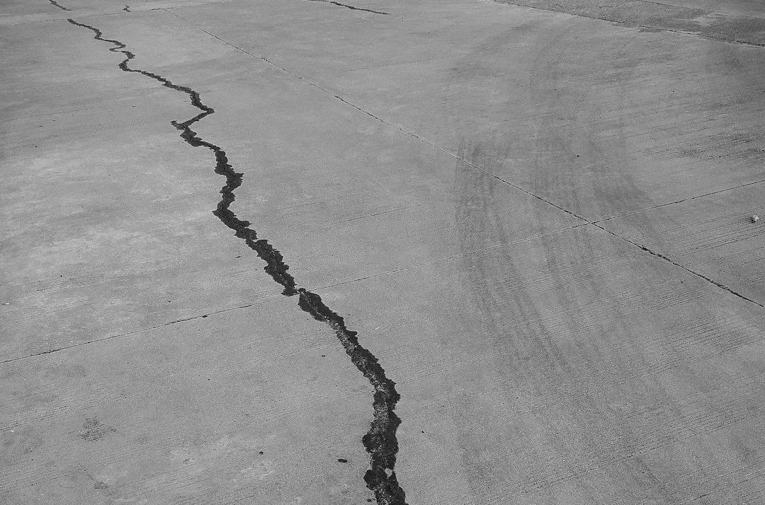 grayscale photo of a wooden floor grayscale photo of a wooden floor