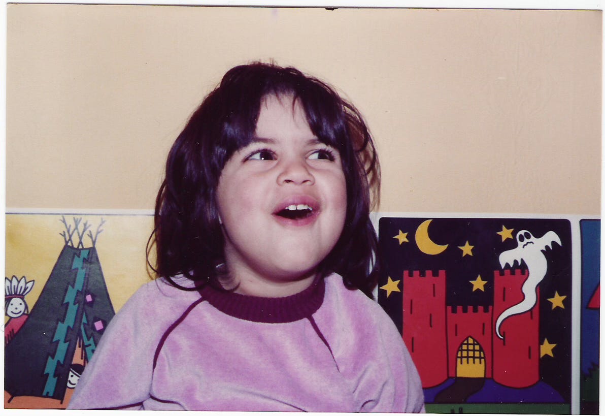 a young child smiling