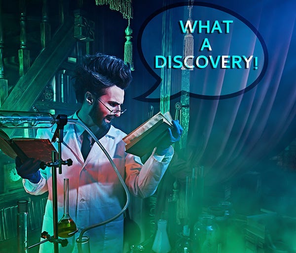 Guy in lab coat in a lab environment reading a book saying, “What a discovery!” Guy in lab coat in a lab environment reading a book saying, “What a discovery!”