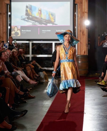 A person walking down a runway

AI-generated content may be incorrect.