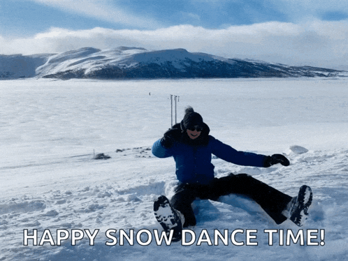 a person is sitting in the snow with the words happy snow dance time