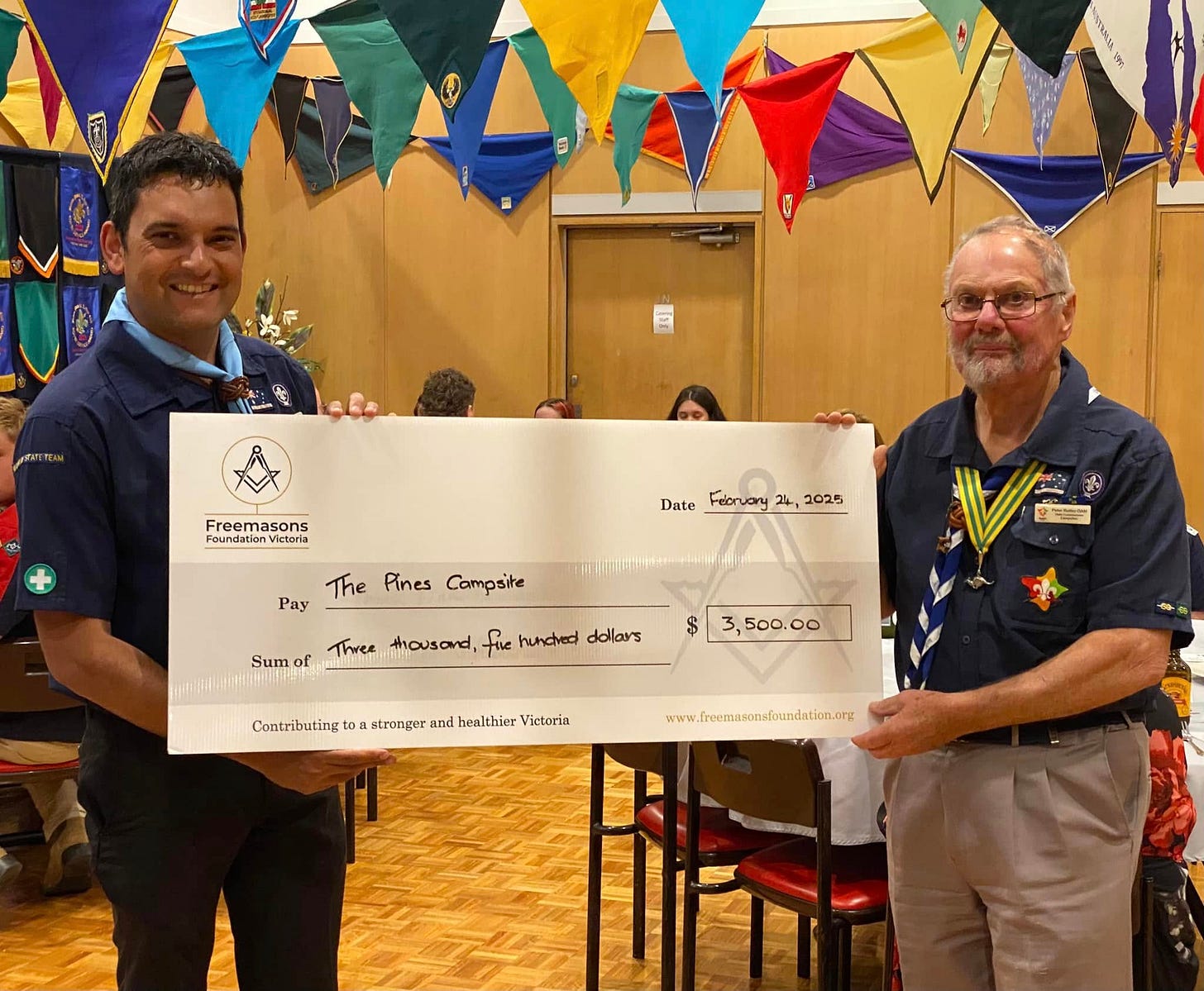 May be an image of ‎5 people and ‎text that says "‎و ၄၆ Freemasons Foundation Victoria Date Feoruany 24, 2025 The Pines Campsite Pay Sumo of Three thousand, fie hunced dollars ,500.00 Contributing 0 stronger and healthier Victoria www.fnemascndoundation.orz tefoundation.ong‎"‎‎