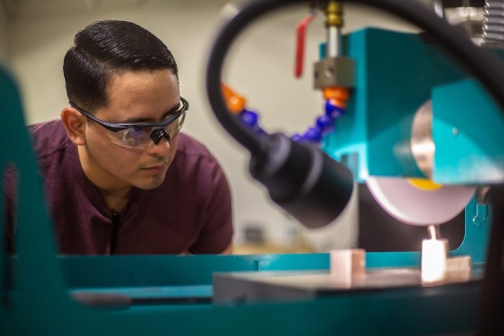 A person wearing safety goggles and looking at a machineAI-generated content may be incorrect. A person wearing safety goggles and looking at a machineAI-generated content may be incorrect.