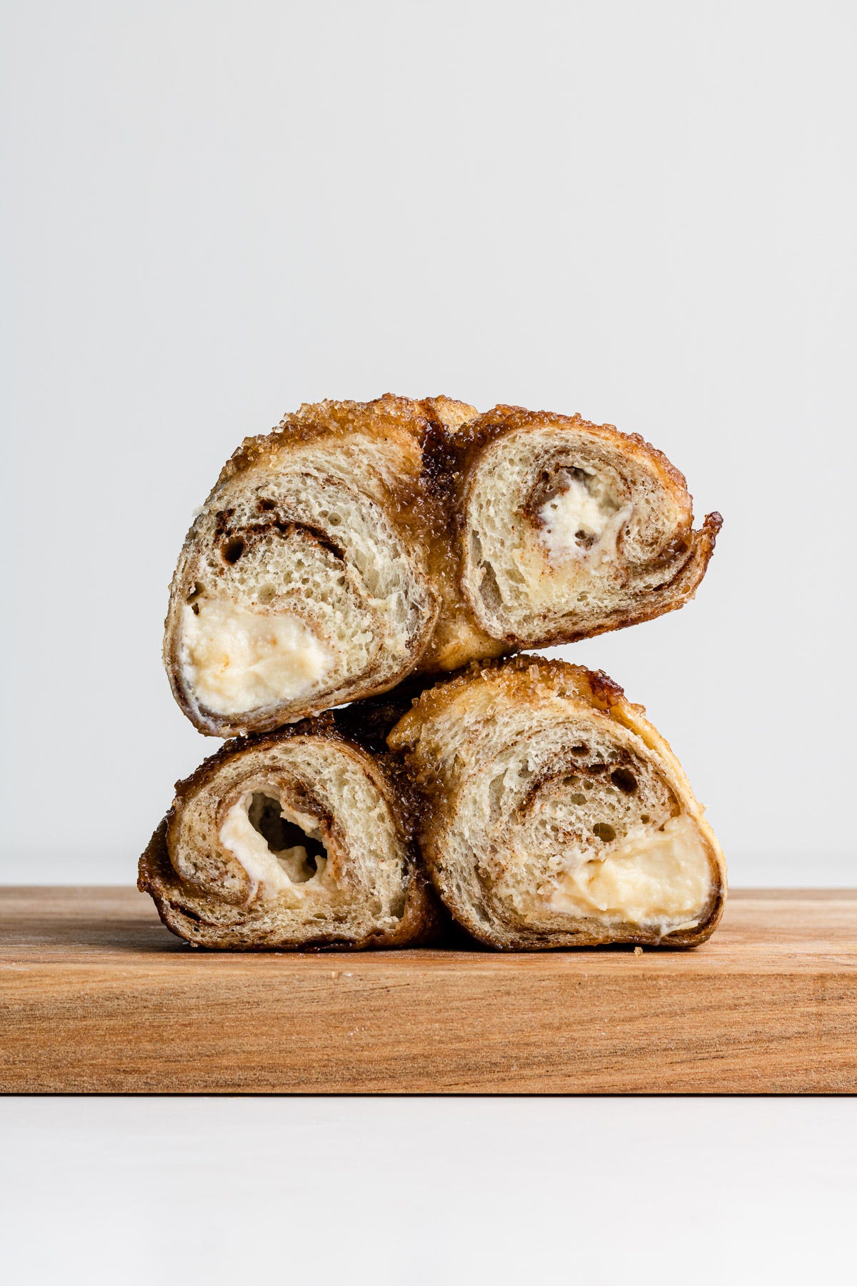 stuffed french toast bagels sliced in half with cream cheese inside