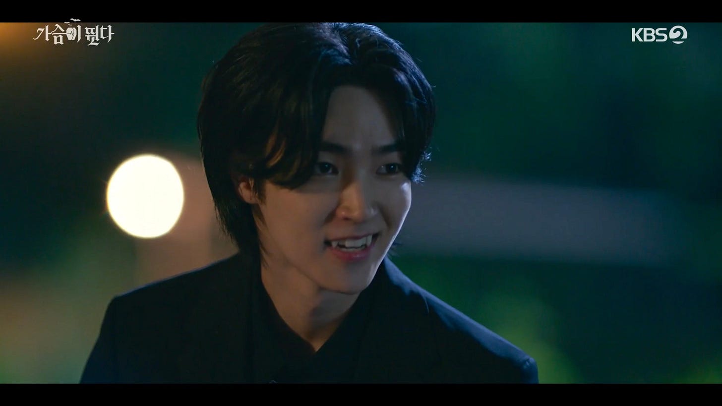 Man-Hwi baring his fangs.