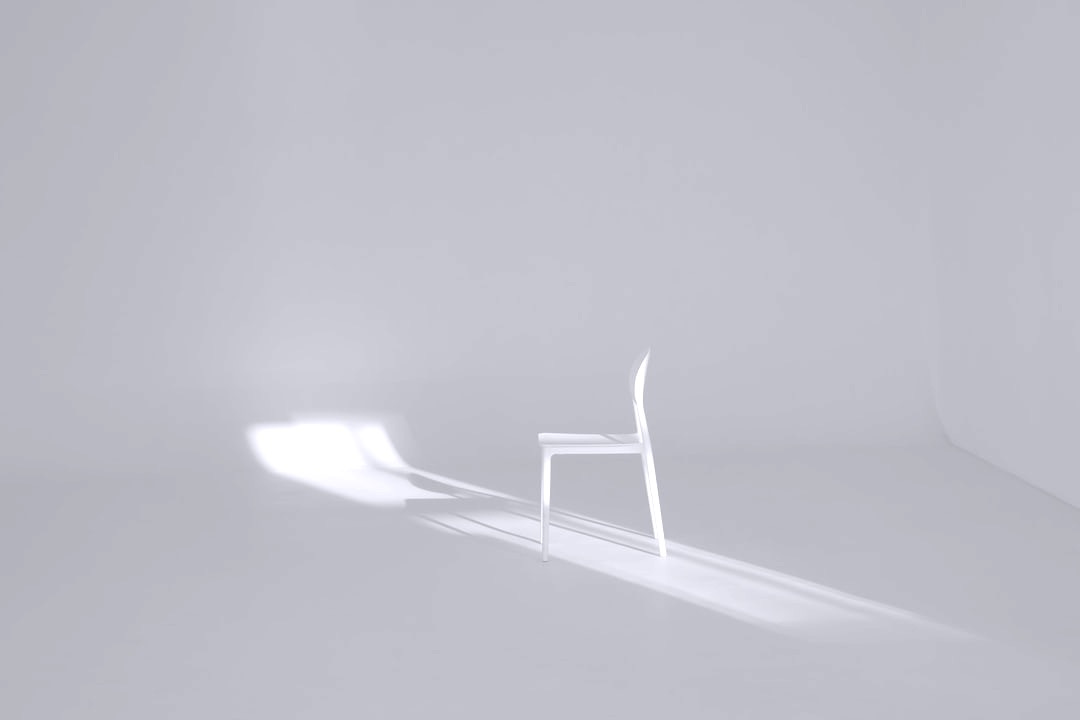 white chair on white surface