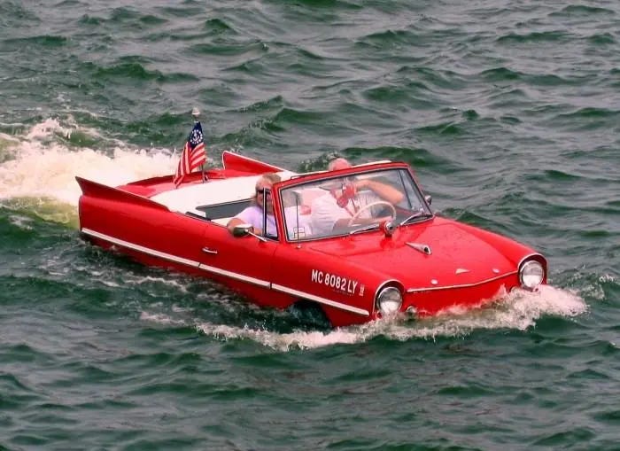 Red "Amphicar" in what we can only describe as "boat mode." Red "Amphicar" in what we can only describe as "boat mode."