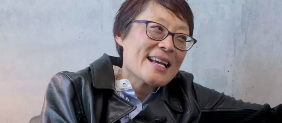 Catherine Liu, smiling, wearing a leather jacket - image from Joshua Citarella's Doomscroll
