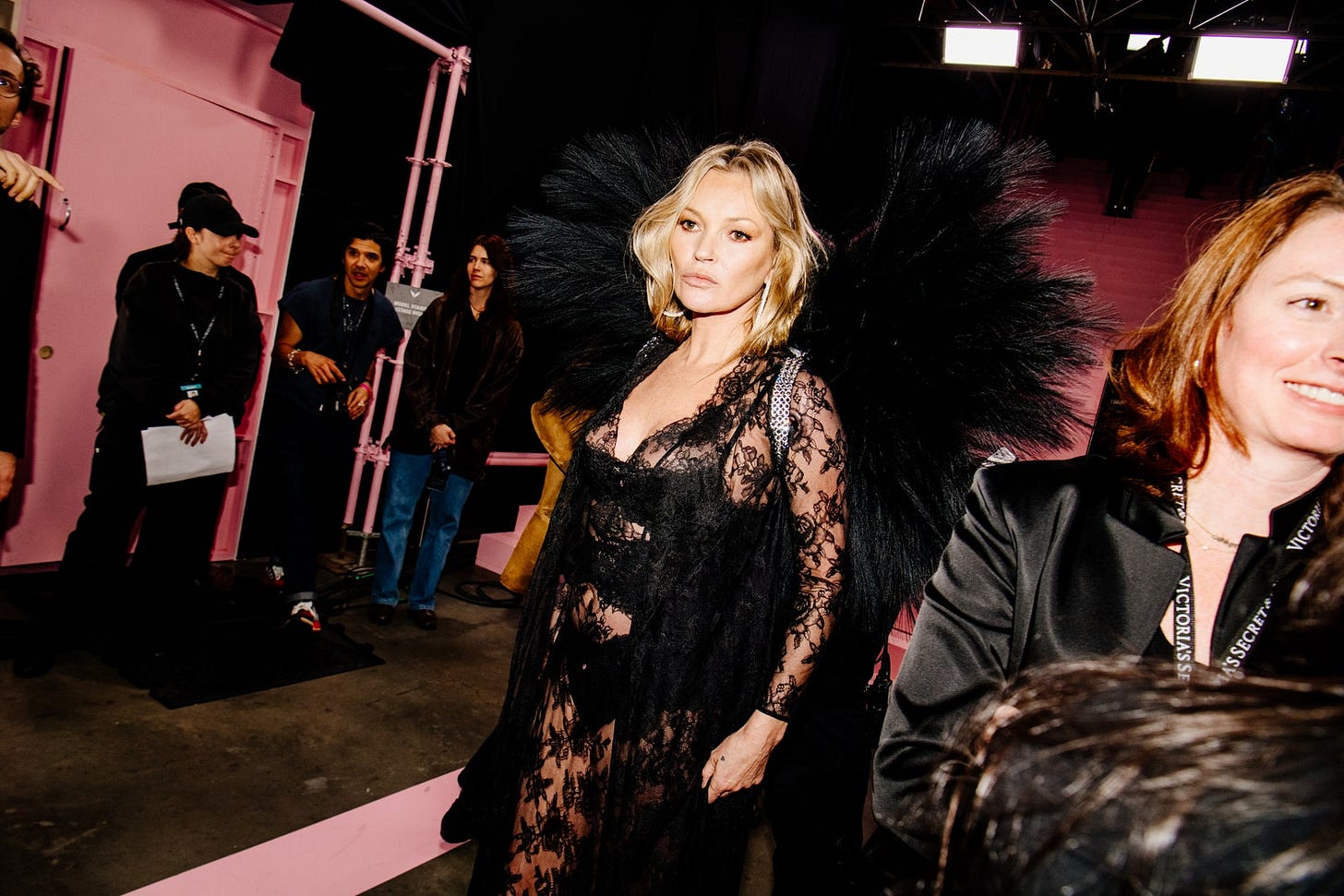 Image may contain Kate Moss Fashion Adult Person Clothing Coat Hat Accessories Glasses Jacket Footwear and Shoe