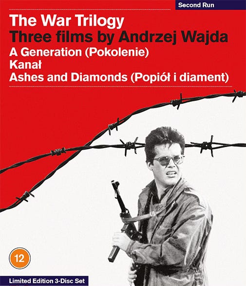 The cover of Second Run's Blu-ray box-set 'The War Trilogy: Three films by Andrzej Wajda. A Generation (Pokolenie), Kanał, Ashes and Diamonds (Popiół i diament). The central image is a black-and-white still of Zbigniew Cybulski holding a machine gun, surrounded by the red and white of the Polish flag, the colours separated by barbed wire.