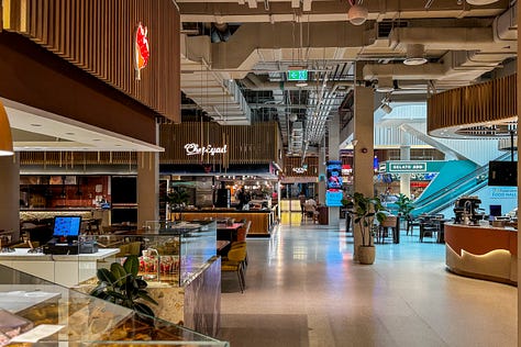 Market Island including Tacos Camino, Kooya Filipino, John Dory Seafood Bar, Wawe coffee, Scarlet's and Gelato Ado