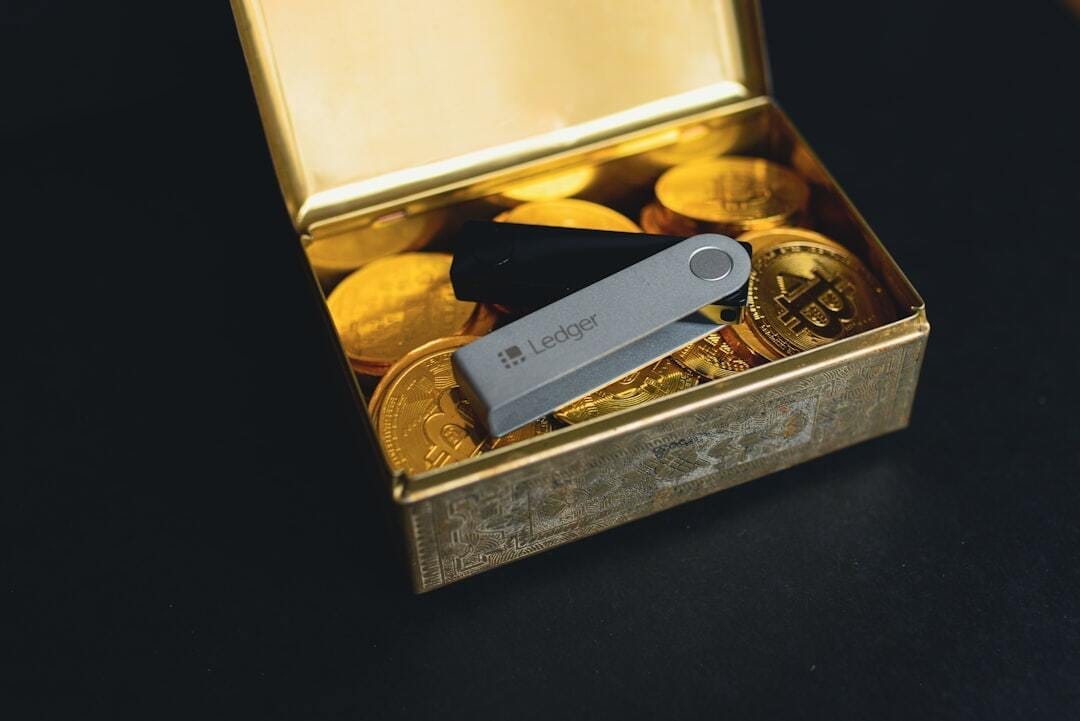a swiss army knife sitting in a box of gold coins a swiss army knife sitting in a box of gold coins