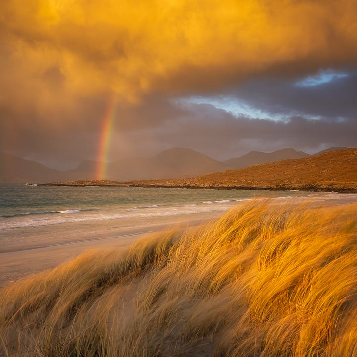 Images of sunset over the beach at Luskentyre, Isle of Harris, Scotland, including gorgeous warm light and a rainbow over the Harris Hills