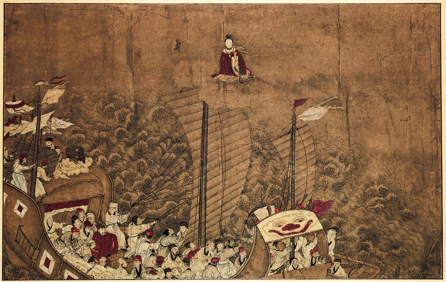 Ancient Chinese painting of ships at sea with a deity figure above on clouds, surrounded by turbulent waves.