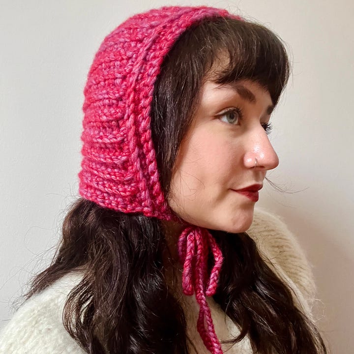 Pictures of the crochet bonnet, scrunchie, and fingerless glove patterns included in the Q1 issue of Material Grrrlz.
