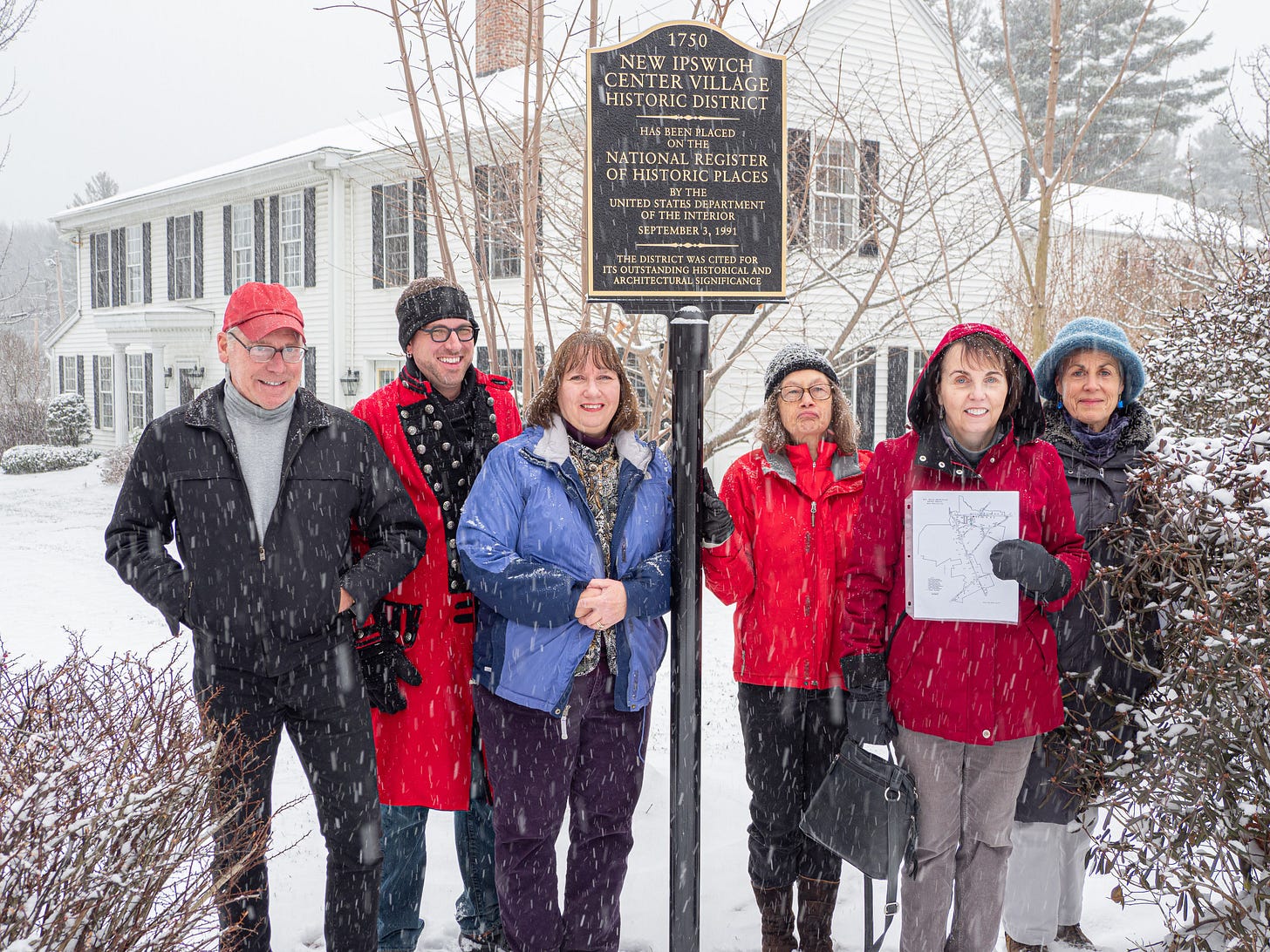 Sign dedication in snow storm