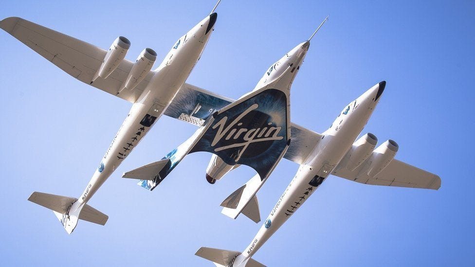 A couple of airplanes flying in the sky

Description automatically generated with low confidence