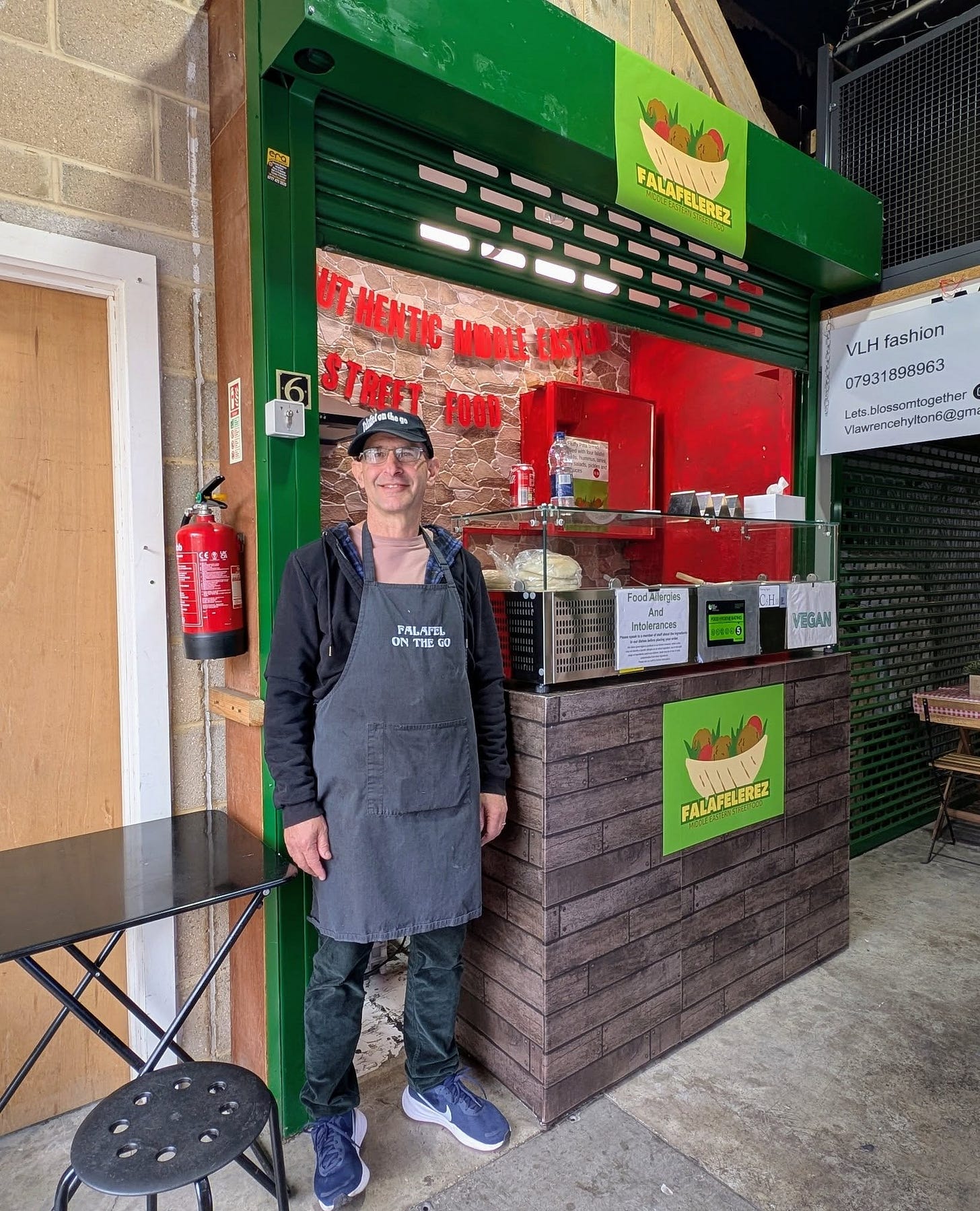 May be an image of 1 person, hotdog and text