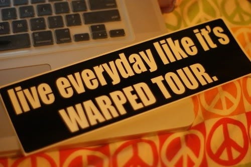 This may contain: a sticker that says live everyday like it's warped tour next to a laptop This may contain: a sticker that says live everyday like it's warped tour next to a laptop