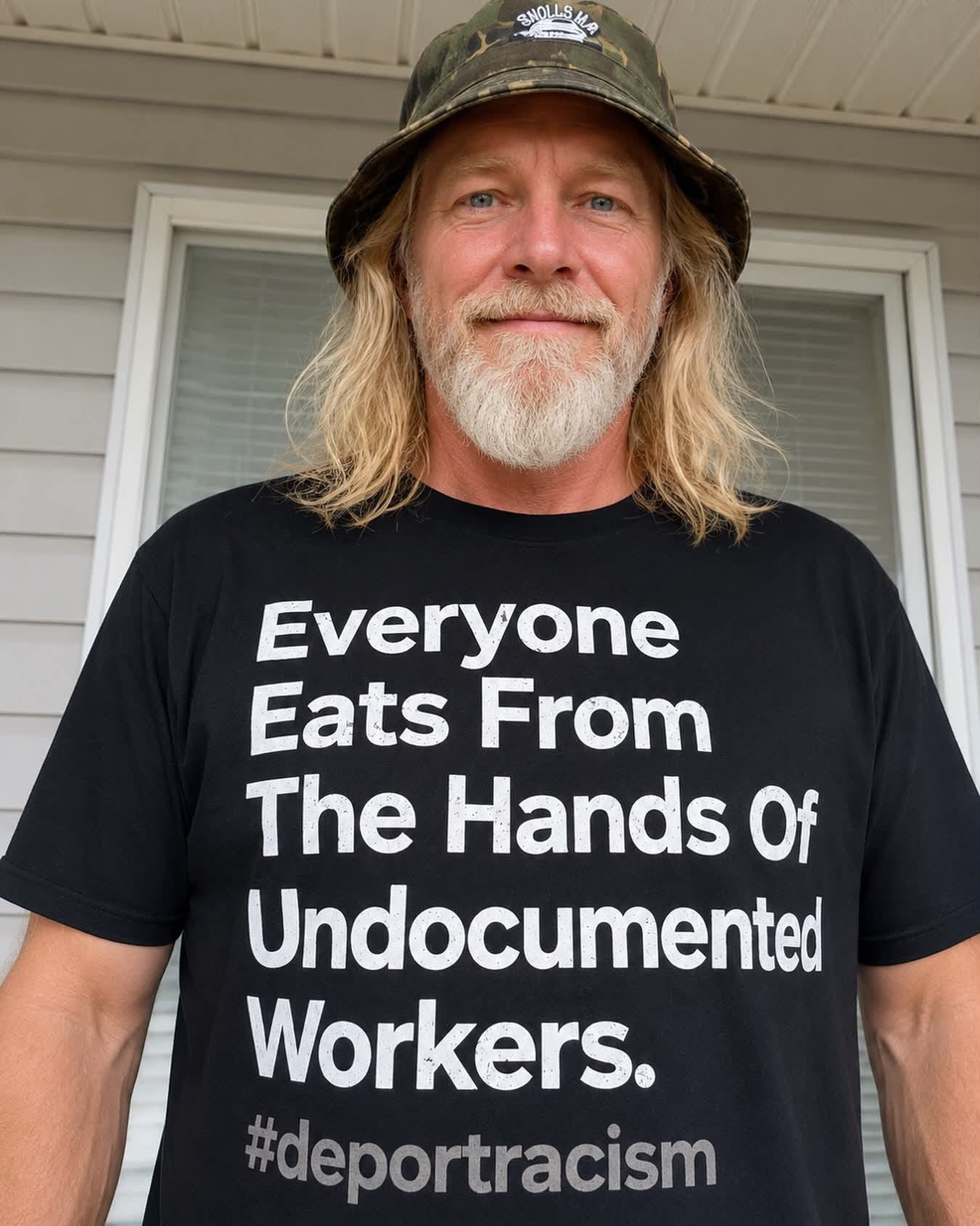 Photo by Lewis Ceo on August 31, 2026. May be an image of standing and text that says 'አሃብይሊ SNOLLSH CHOLL Everyone Eats From The Hands Of Undocumented Workers. #deportracism'.