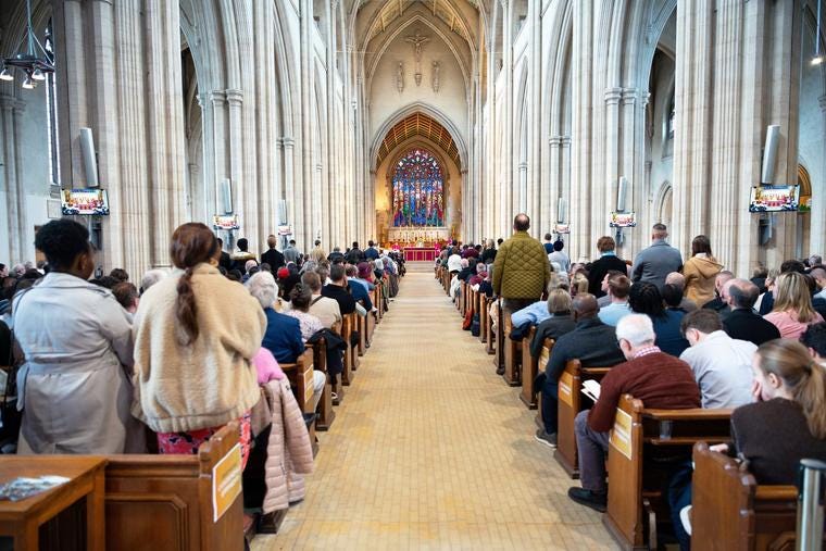 Catechumens, candidates and sponsors gather at St. George's Cathedral in London for the Feb. 21 Rite of Election as Southwark Archbishop John Wilson presides over the ceremony.