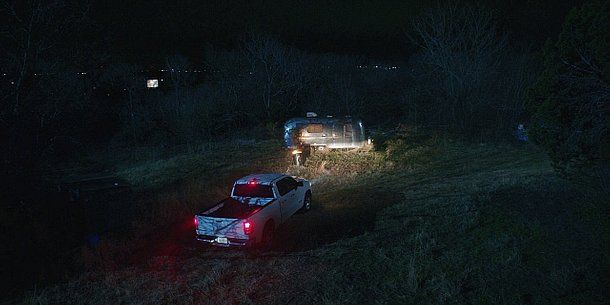 Walker Fenton pickup truck driving out to silver stream trailer. Walker Fenton pickup truck driving out to silver stream trailer.