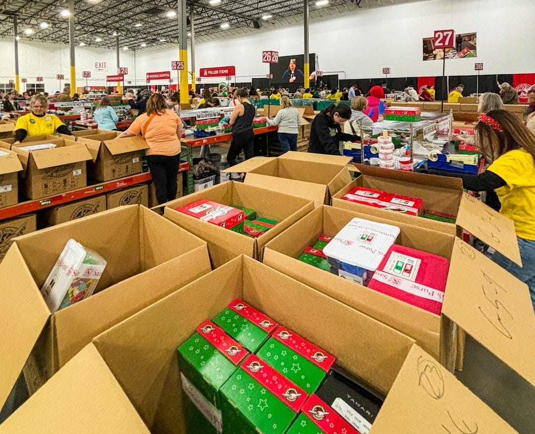 A large warehouse filled with lots of boxes