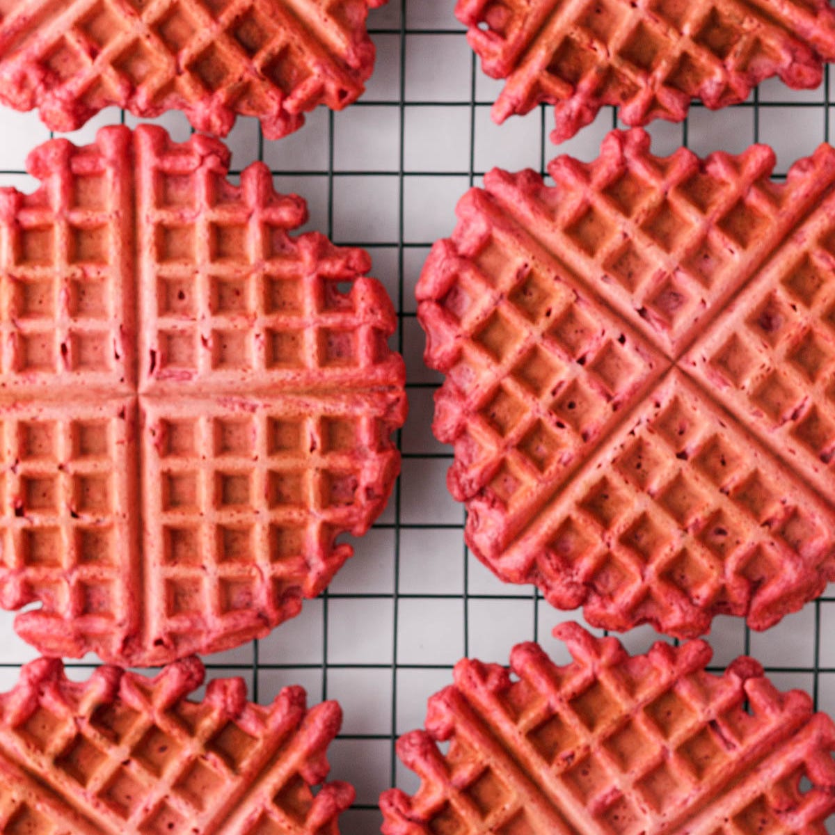 overhead image of beetroot waffles cooling on rack overhead image of beetroot waffles cooling on rack