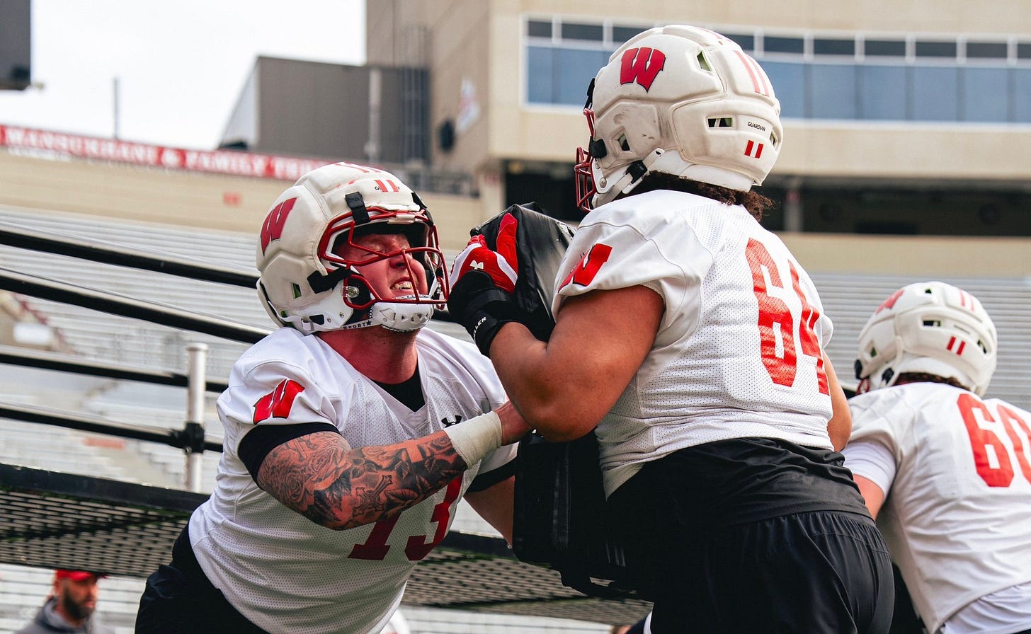 Wisconsin Badgers offensive lineman Blake Cherry participates in a drill during spring practice.