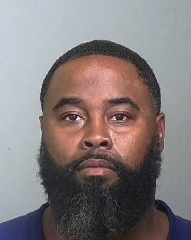 Assistant Football Coach Arrested on Charge of Soliciting Sexual Contact With Student