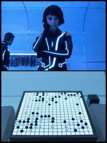 In “Tron: Legacy” (2010) Quorra, a computer program, mentions to Sam that  she rarely beats Kevin Flynn at their strategy board game. This game is  actually “Go”, a game that is notoriously