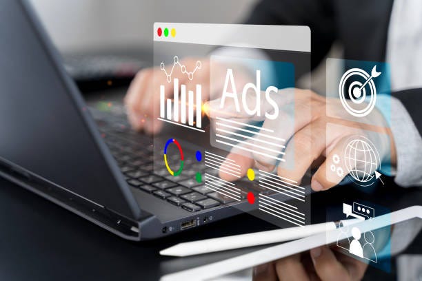 Business digital marketing commerce online sale concept. People use laptop to advertise on website.