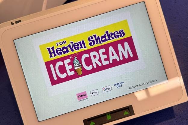 A small electronic device with a screen

AI-generated content may be incorrect.