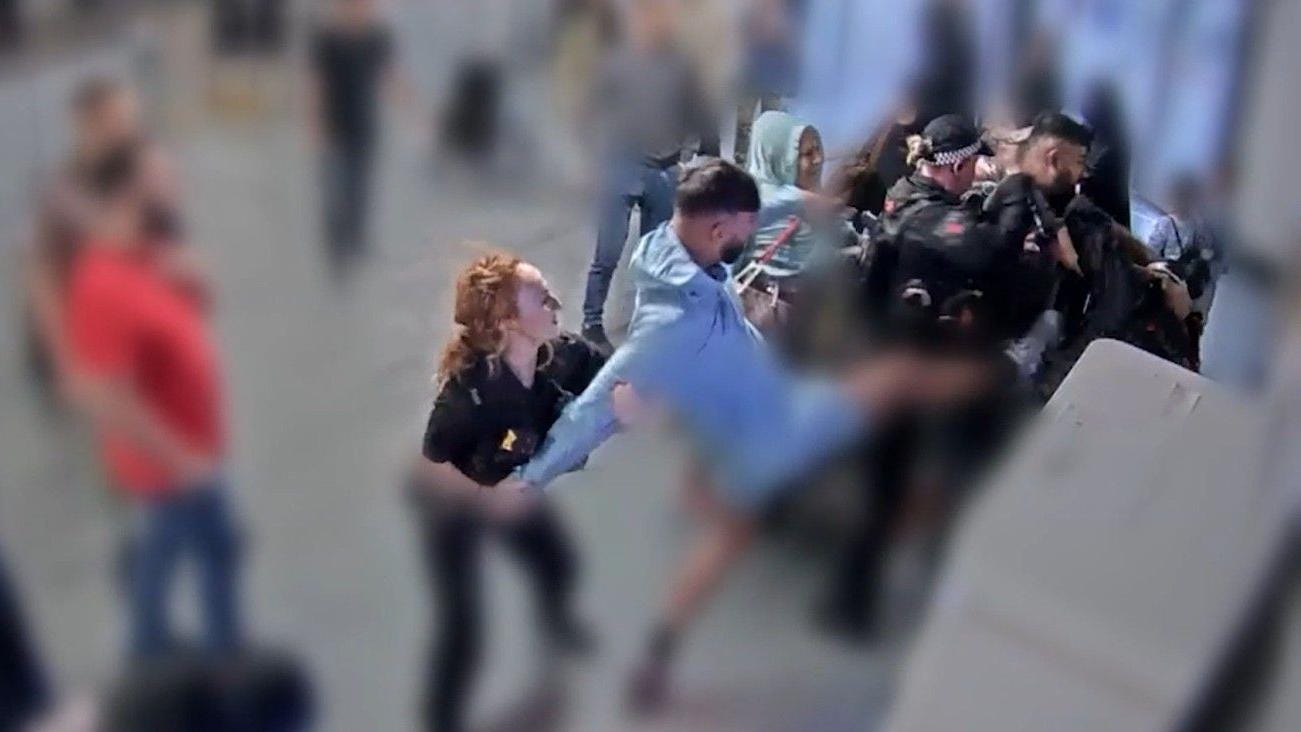 PC punched in Manchester Airport brawl 'absolutely terrified' PC punched in Manchester Airport brawl 'absolutely terrified'