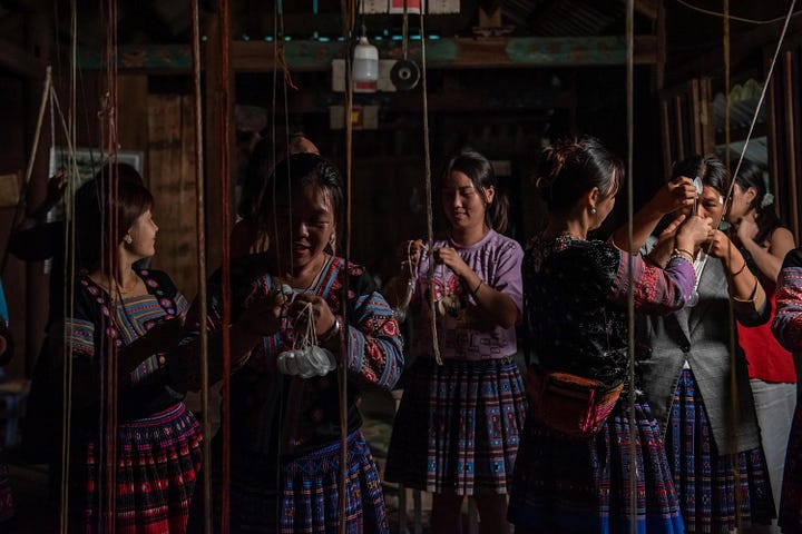Images: 1. Theatre curtains and backdrop made using Camira Fabrics’ fire resistant hemp and wool grown in East Yorkshire [Credit: Company, Place]; 2. Still from ‘Mother Goddess of the Three Realms’ showing Blue H’mong craftswomen collaborating to create a 20-metre long braided rope as an offering to the Mother Goddess [Credit: Benjamin Reich]
