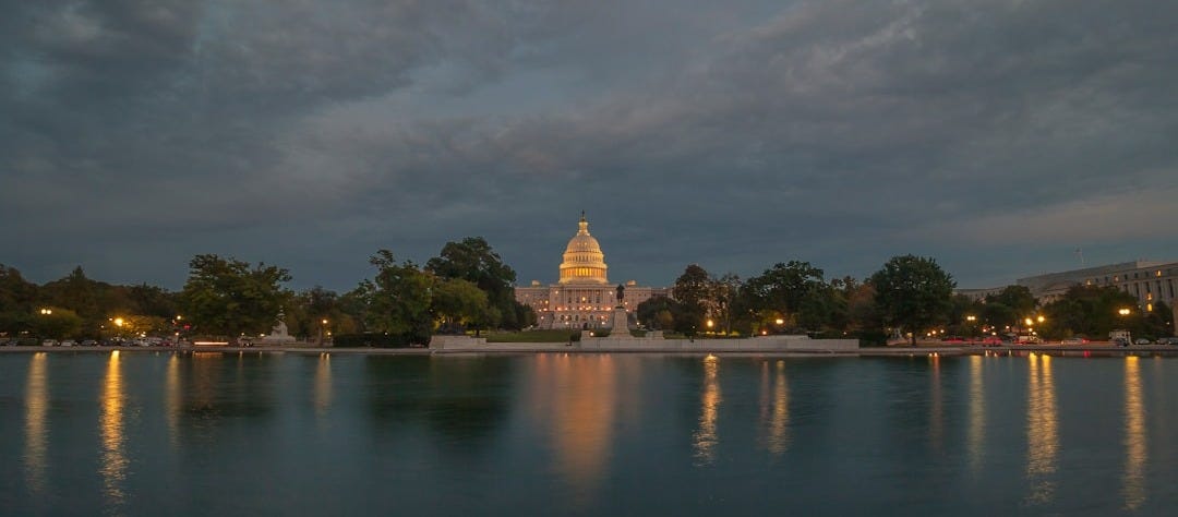 gold tower under grey sky