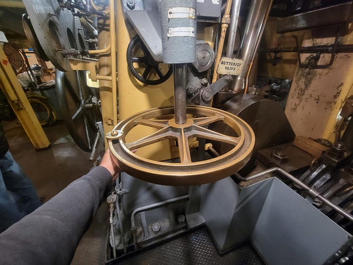 The draft fan, the throttle wheel, the chief's desk and a pressure gauge.
