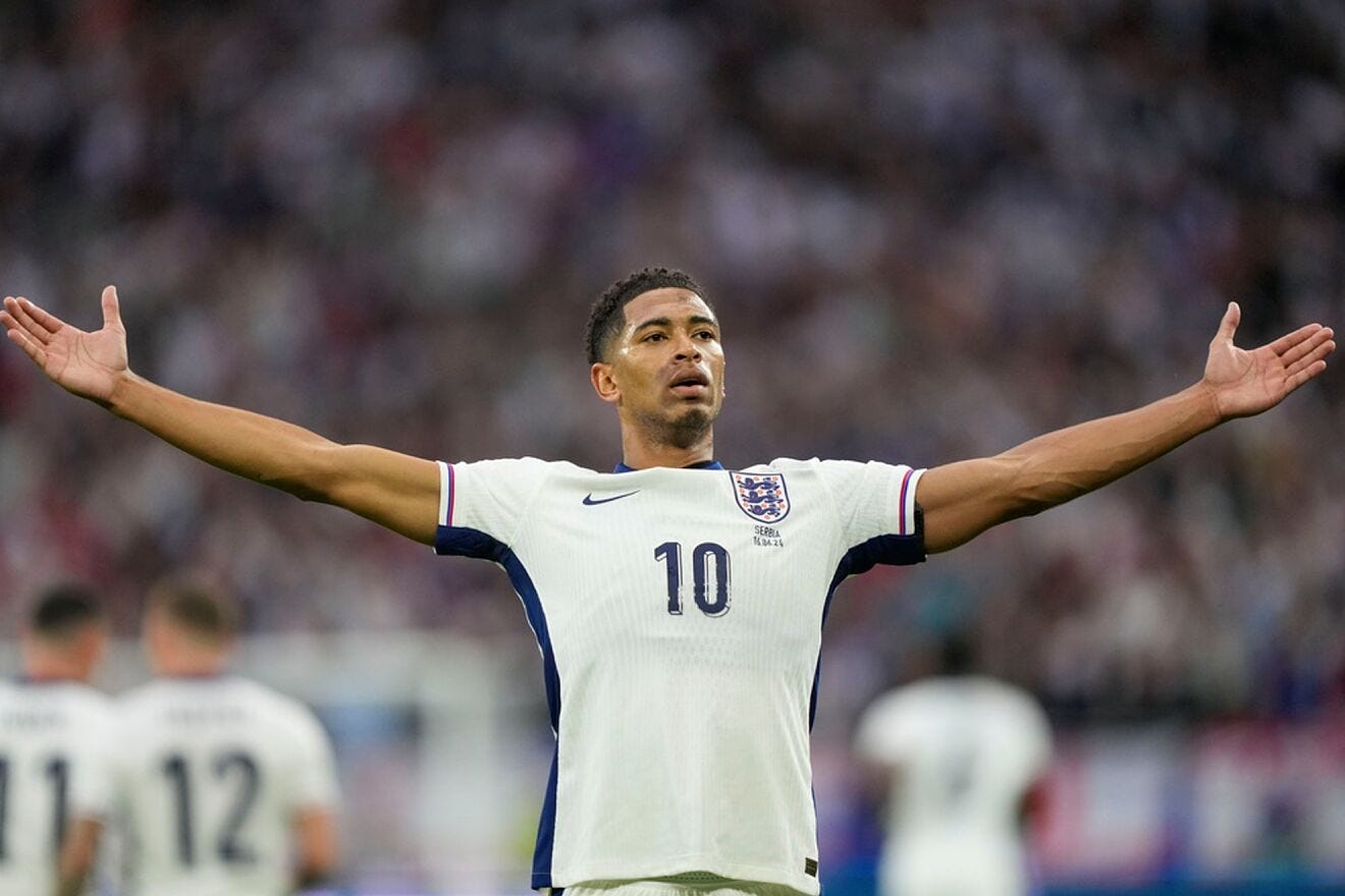 England&apos;s Jude Bellingham celebrates after scoring the opening goal /