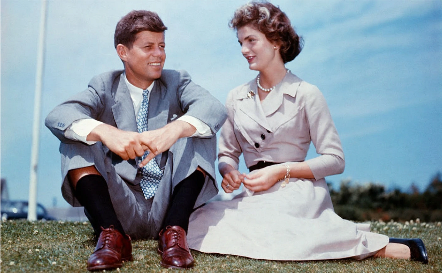 John F. Kennedy and his future wife Jacqueline Bouvier sit together in Hyannis Port, Massachusetts, in June 1953, a few months before their wedding.