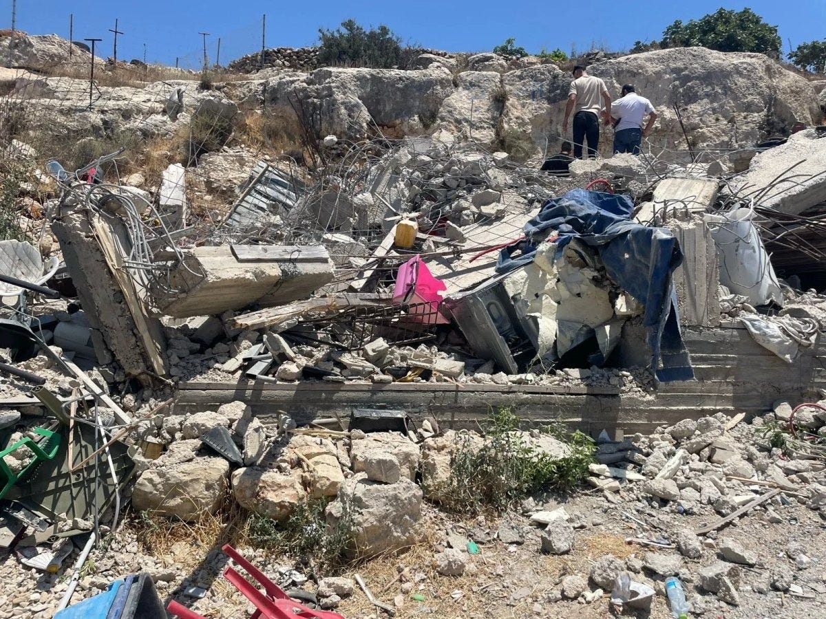 Concrete rubble and household belongings at Nahhalin Concrete rubble and household belongings at Nahhalin