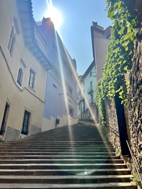 Spanish alleyway with stairs and lens flare