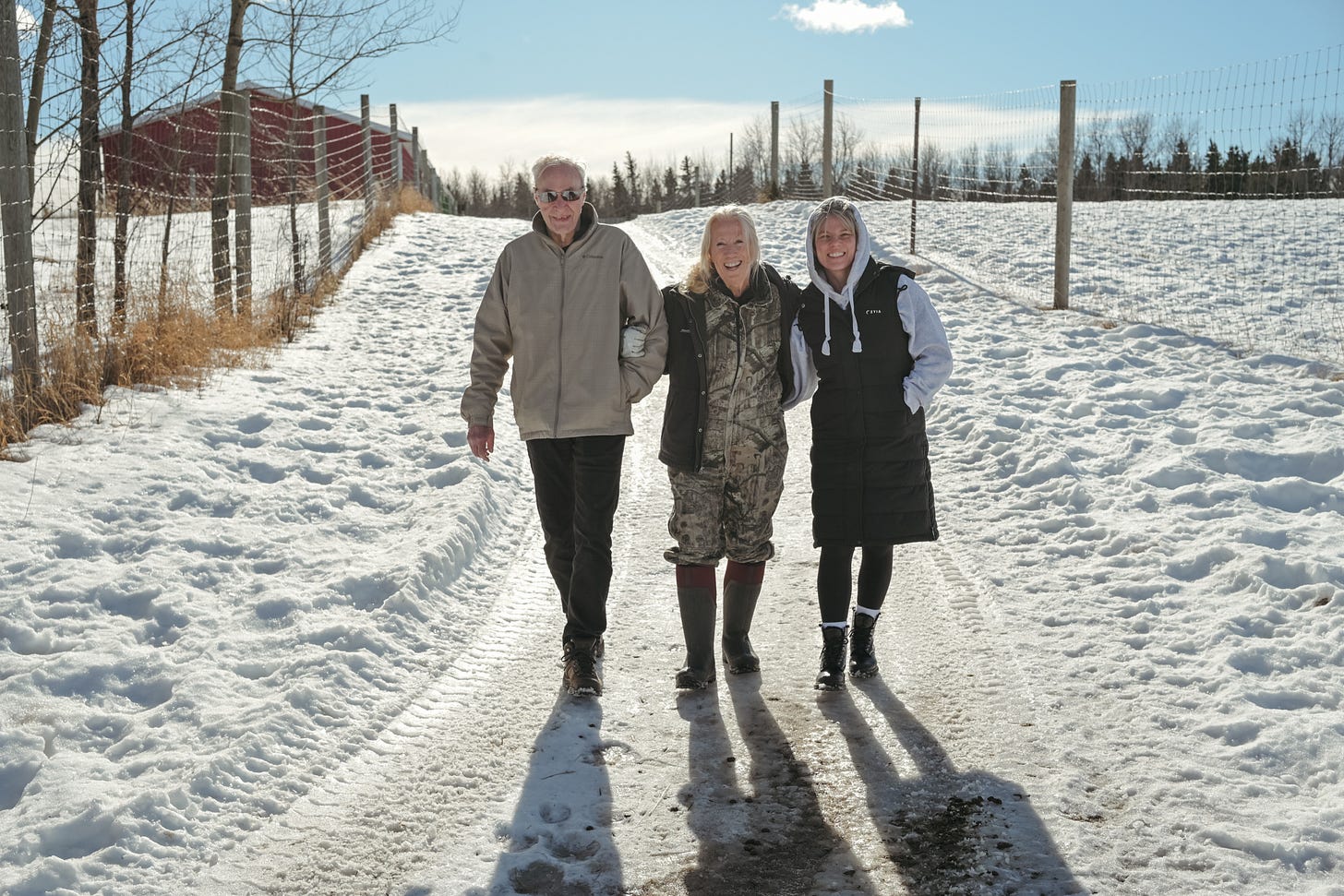 My dad Elk ranch owner Diane and my daughter in law Brie walking on the ranch